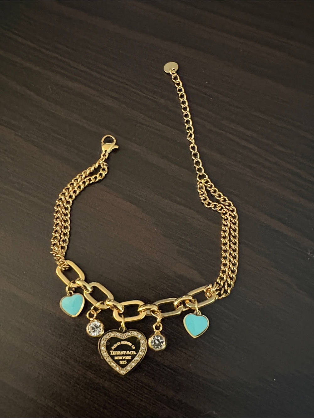 224)Inspired by Tiffany stainless steel goldtone Charm Bracelet with Blue Hearts